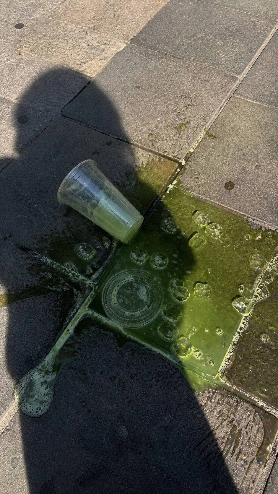 Realistic Spilled Iced Drink Street Photography