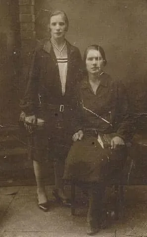Vintage Sepia Portrait: Two Women in 1930s Fashion